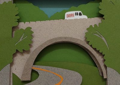 Hand-cut Paper Art: Dairy Truck on Bridge